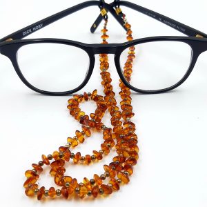 Gintaro skaldos akinių virvelė